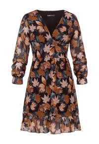 Bloemenjurk met lange mouwen, V-hals en een gathered taille. Gemaakt van lichte stof met een print van bruine en teal bladeren op een zwarte achtergrond.