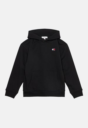 Felpa nera con cappuccio, maniche lunghe, tasca frontale a marsupio e piccolo logo Tommy Hilfiger sul petto sinistro.