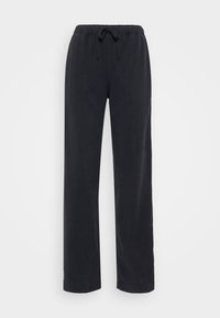 Black, loose-fitting, cotton pants with an elastic waistband and adjustable drawstring. Straight leg design with no visible pockets or embellishments.