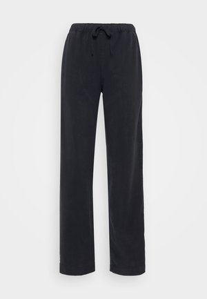 Black, loose-fitting, cotton pants with an elastic waistband and adjustable drawstring. Straight leg design with no visible pockets or embellishments.