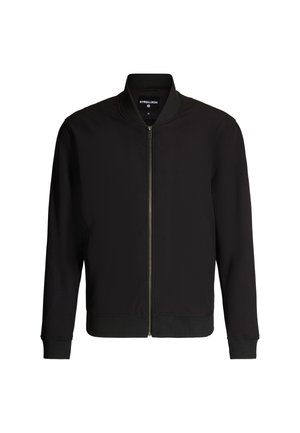 Veste bomber noire en tissu texturé, avec col et poignets côtelés, fermeture éclair à l'avant et détails subtils. Design classique et minimaliste.