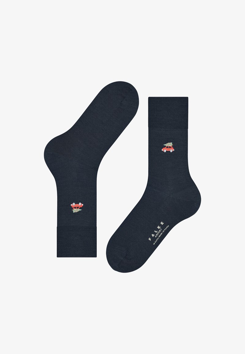 Calze blu navy realizzate in tessuto strutturato, con un'auto rossa che trasporta un albero di Natale ricamata sulla caviglia. Nome del marchio stampato sul lato.