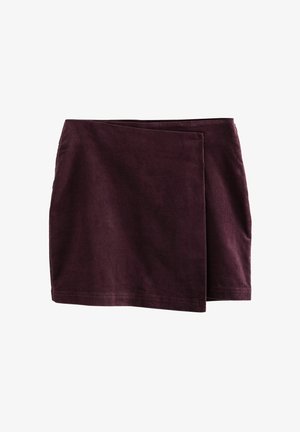 Burgundy wrap skirt made of soft fabric, featuring asymmetrical design and clean edges, suitable for casual wear.