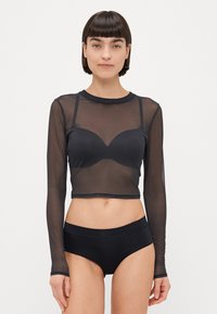Czarny long-sleeve top z siateczki z przezroczystym materiałem i okrągłym dekoltem, zestawiony z czarnymi majtkami bikini z wysokim stanem. Prosty, dopasowany krój.