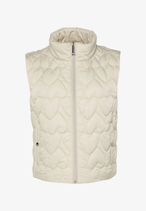 Kamizelka pikowana w kolorze kremowym z wzorem w kształcie serca, z wysokim kołnierzem i zamkiem błyskawicznym z przodu. Posiada boczne zatrzaski do zapięcia.