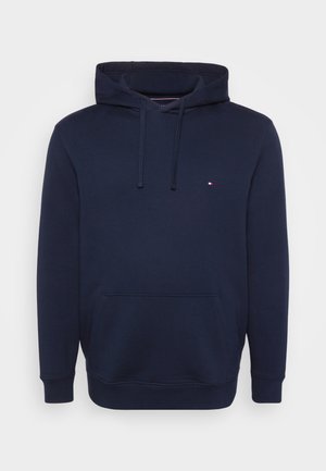 Hanorac bleumarin din amestec de bumbac, cu buzunar frontal, glugă cu șnur și un logo mic pe piept. Textură netedă.