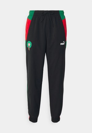 Puma MOROCCO PANTS - Tréningruha alsók - black/vine/for all time red