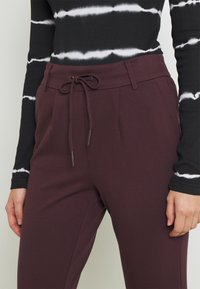 ONLY Träningsbyxor - bordeaux