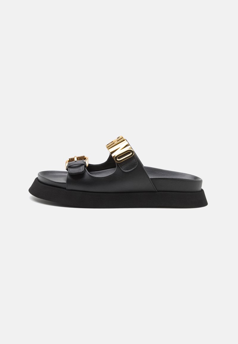 Mules Lettering MOSCHINO MAXI LETTERING - Mules - black - Zalando.co.uk