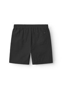 Black cotton shorts with an elastic waistband, featuring a single rear pocket and a small brand label on the back.
