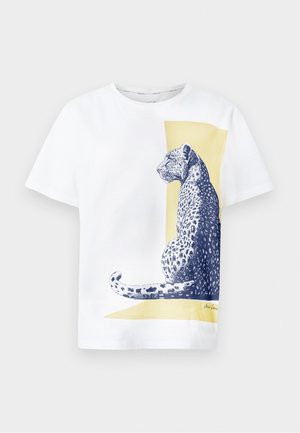 White short-sleeve shirt with a blue leopard illustration sitting against a yellow rectangular background on the front.