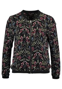 Veste bomber noire zippée avec un motif floral aux accents rouges, bleus et verts ; poignets et ourlet côtelés ; tissu doux et texturé.
