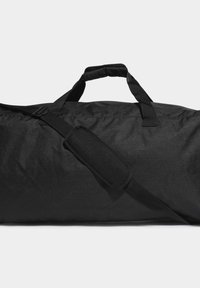 Borsa a sacca nera realizzata in tessuto resistente; presenta manici doppi e una tracolla imbottita e regolabile con impugnatura in rete.