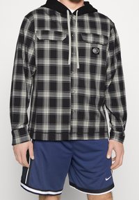 Nike Performance Let jakke / Sommerjakker - black