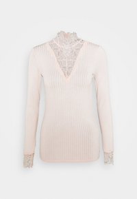 Ribbad långärmad topp i mjuk rosa med en V-hals av spets och spetsmuddar, med en texturerad finish och en figurnära silhuett.