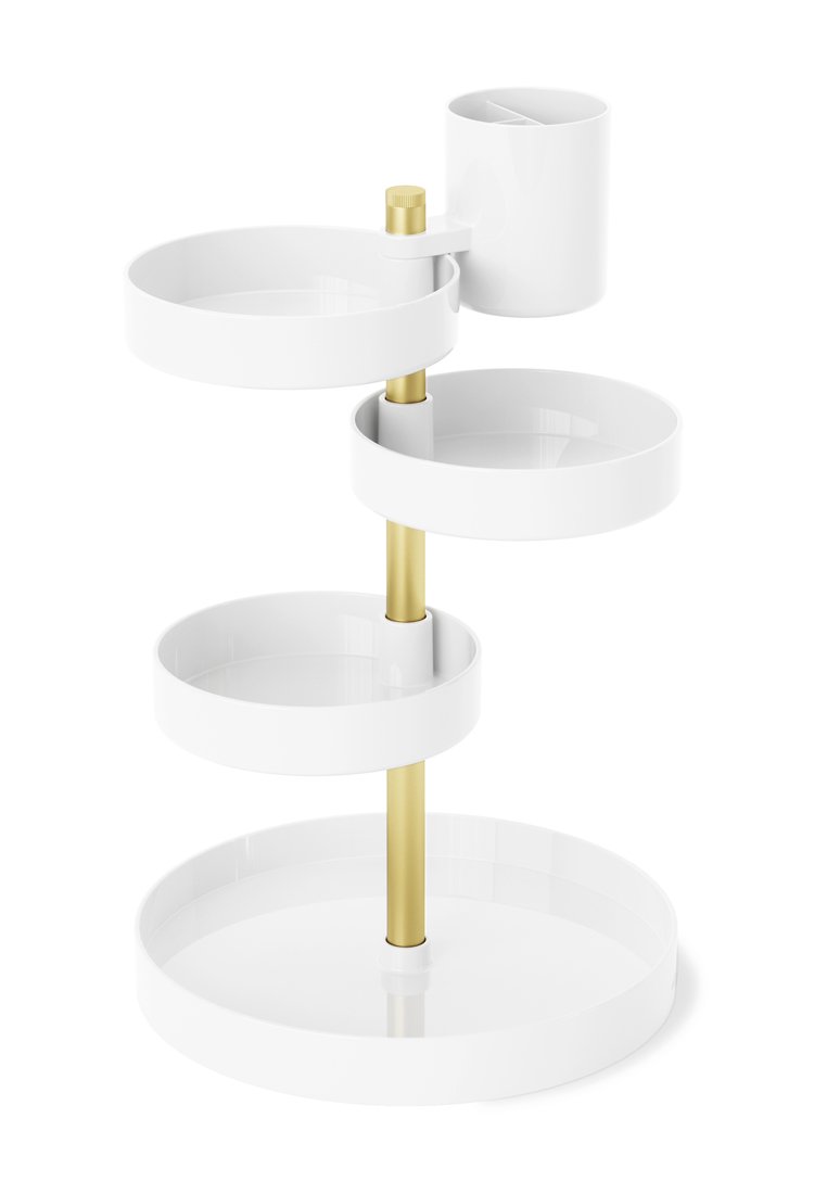 Organisateur blanc à plusieurs niveaux avec trois plateaux ronds, support en métal doré et porte-gobelet. Surface lisse et design minimaliste.