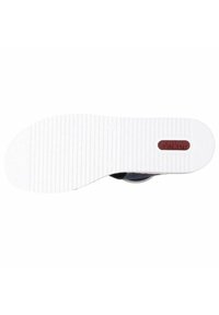 Rubber shoe outsole featuring a textured, ridged surface in white with a red logo label embedded. The design supports traction and durability.
