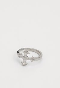 Silver ring featuring a fleur-de-lis design, polished finish, smooth texture, and a slight curve in the band.