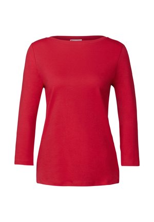 Chemise rouge à manches longues, en coton doux, avec un col rond et une coupe décontractée, au toucher lisse et sans motifs ni accents visibles.