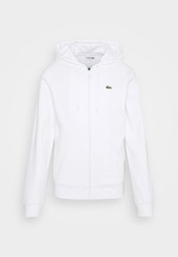 Witte hoodie met ritssluiting van een katoenmengsel, voorzien van een capuchon met trekkoord en een klein groen logo op de linkerborst. Zachte structuur, lange mouwen.