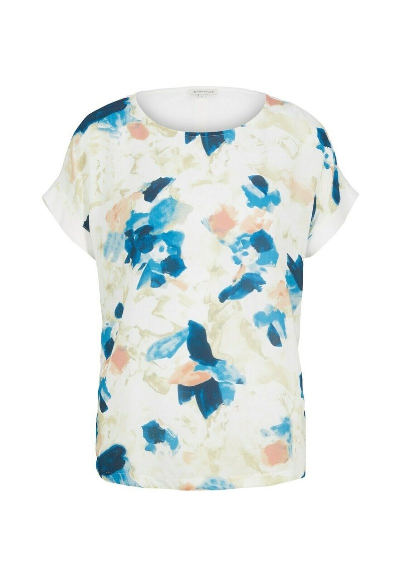 Blusa floral con mangas cortas, cuello redondo y corte holgado. Fabricada en una tela ligera con patrones en acuarela en azul, rosa y verde.