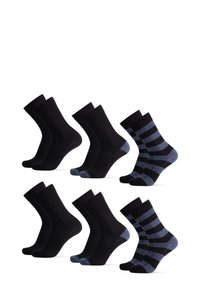 Quatre paires de chaussettes en coton : deux paires noires unies, une paire avec des orteils bleu clair, et deux paires avec des rayures noires et bleu marine. Toutes de longueur genou.