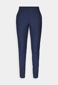 Námořnické modré kalhoty na míru se slim fit střihem, zapínáním na knoflík a hladkou texturou látky. Obsahují postranní kapsy a čistý design pasu.