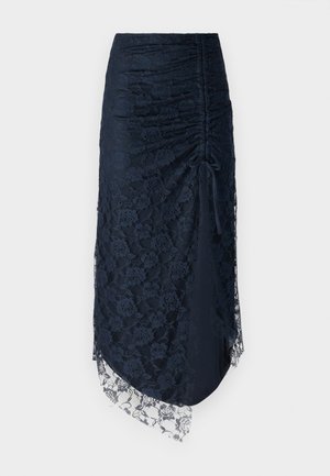 Saia de renda azul-marinho com design franzido, bainha assimétrica, padrão floral e um acabamento de renda transparente na parte inferior. O material parece ter textura.