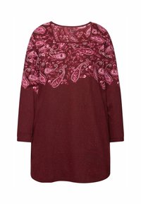Vínová dlouhá rukávová blůza s paisley vzorem v růžové barvě. Kulatý výstřih s rovním lemem a strukturovanou tkaninou.
