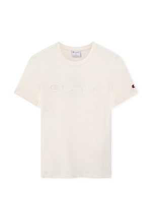 T-shirt in cotone color crema a maniche corte con logo "Champion" in rilievo sul petto e piccolo emblema Champion sulla manica sinistra.