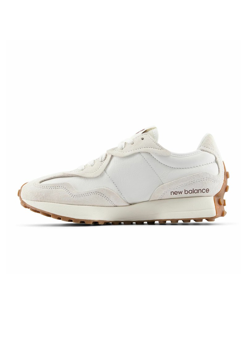 White and beige New Balance sneaker with suede overlays, lace-up front, and textured brown rubber sole and heel grip.