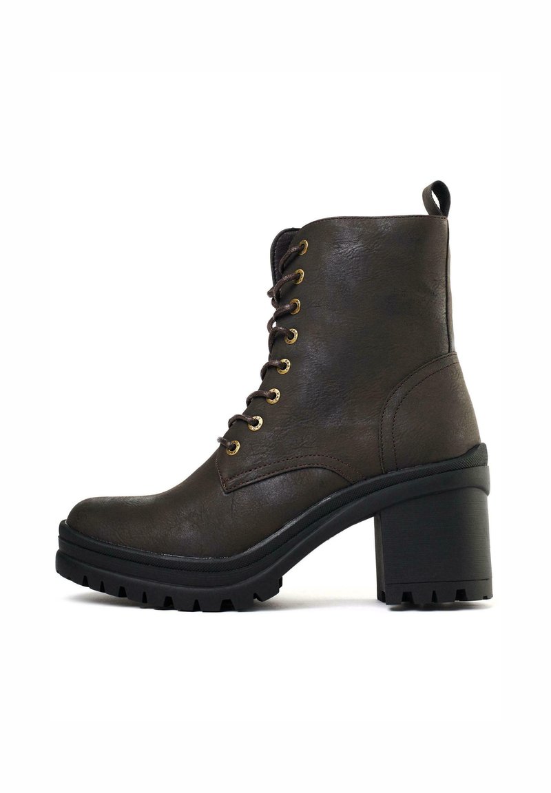 Brown leather ankle boot with a rounded toe, lace-up design, gold-tone eyelets, and a chunky black heel. Textured surface with rugged sole.