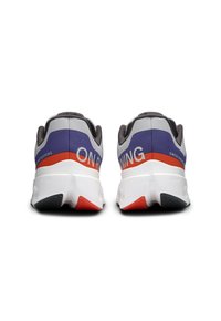 Running shoes with a gray upper, purple and red accents, featuring smooth surfaces, a prominent logo, and textured soles for traction.