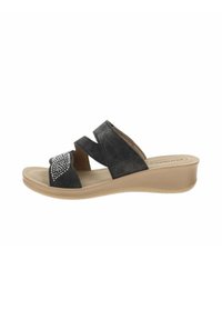Sandalo slide in suede nero con due fasce incrociate, caratterizzato da un motivo decorativo di strass sulla tomaia. Suola imbottita beige che offre supporto.