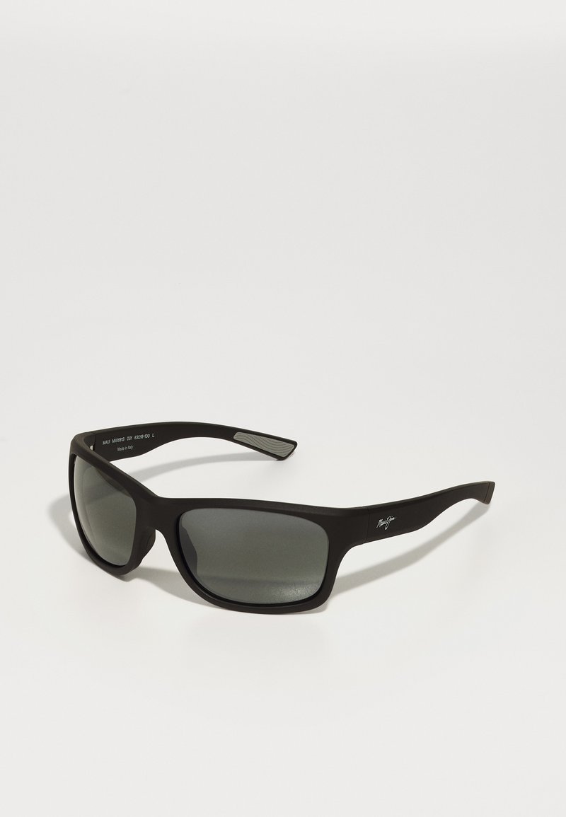 Black plastic sunglasses with gray lenses, rectangular shape, and a matte finish. Features a logo on the side of the arm.