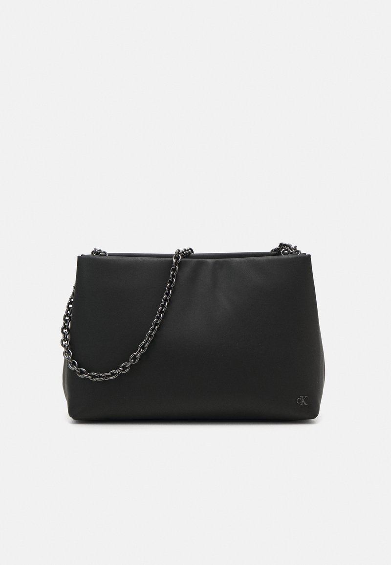 Black faux leather shoulder bag with a textured surface, featuring a chunky chain strap and a logo detail on the side.