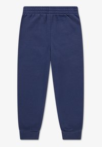 Pantaloni de trening din bumbac de culoare bleumarin, cu talie elastică și manșete tricotate; textură netedă, design cu picior drept, fără detalii suplimentare.