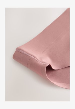 Light pink fabric with a smooth texture, folded showing a hem and seams. The design features a narrow, rolled edge for a clean finish.