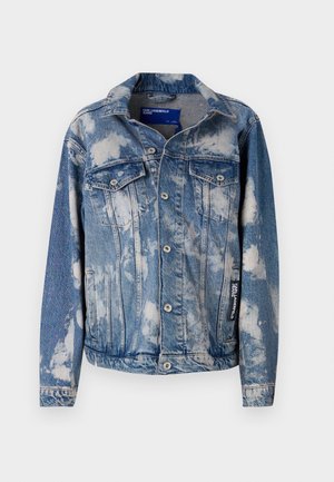 Denim jacket with a light blue color and cloud-like white patterns. Features two chest pockets, snap buttons, and a classic collar design.