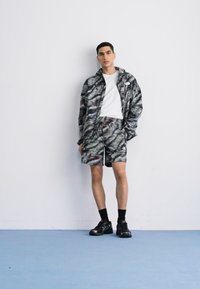 The North Face EASY WIND - Šortky - black