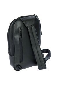 Borsa a tracolla in pelle nera con una forma rettangolare elegante, due scomparti con zip e una tracolla regolabile. Texture liscia e design minimalista.