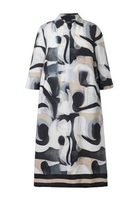 Manteau long avec motifs abstraits tourbillonnants en noir, blanc, gris et beige, manches trois-quarts et col.