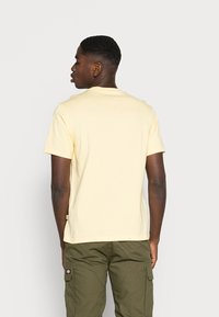 Dickies MAPLETON - T-shirt básica - pale banana