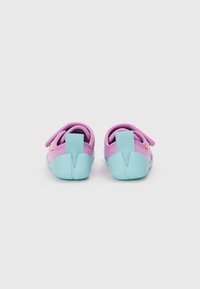 Children's shoes in light purple and aqua, featuring a smooth material, rounded design, and adjustable strap for easy wear.