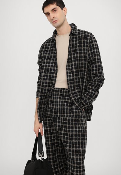 Henrik Vibskov ECLIPSE PANTS UNISEX - Hlače - black