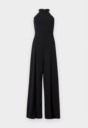 Schwarzer Jumpsuit mit hohem Ausschnitt, tailliertem Oberteil und weiten Hosenbeinen. Hergestellt aus einem glatten Stoff mit sichtbaren Falten und einem Schlitz im Rücken.