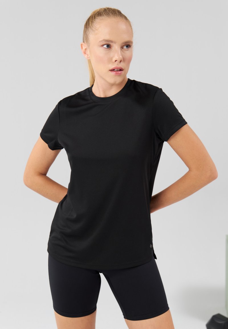 Even&Odd active ESSENTIAL T-SHIRT WITH RELFECTIVE STRIP - Sports T-shirt - black