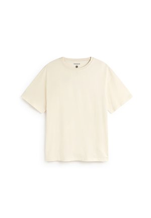 T-shirt crème à manches courtes, col ras du cou, posé à plat sur fond blanc, sans motifs ni logos visibles.