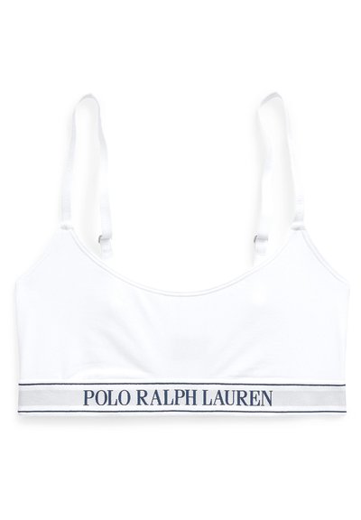Vit bomullstopp med justerbara axelband och en marinblå logoband med "POLO RALPH LAUREN" längst ner. Slät textur.