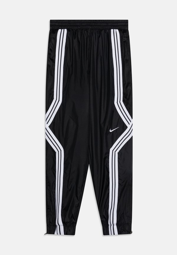 CROSSOVER PANT UNISEX - Tracksuit bottoms